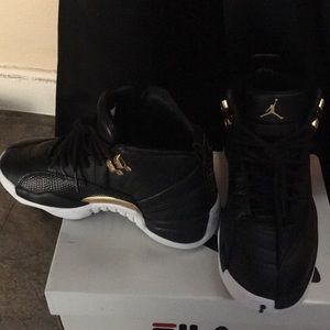 The air jordan 12 reptile black metallic gold